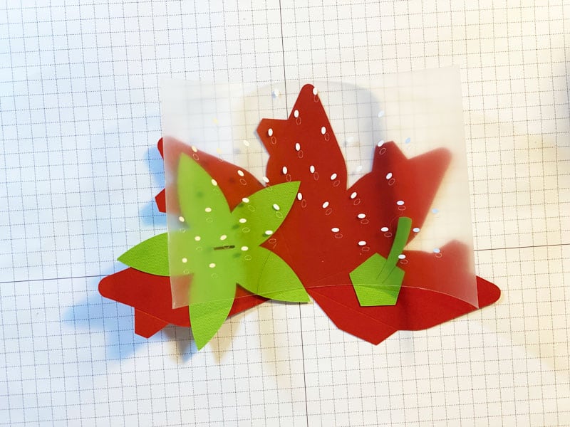 Strawberry pieces cut out with Cricut Maker.